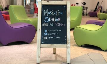 chalk board sign for The Musication Station