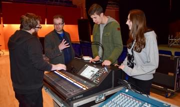 students learning the technical side of things