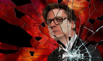 Ed Byrne looking into the camera with a layer of smashed glass over the image and clock in the background