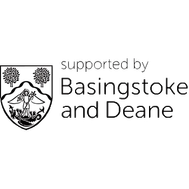 The shield of Basingstoke and Deane which has two trees, and an angel stood on a dragon. This is next to text that reads 'supported by Basingstoke and Deane'