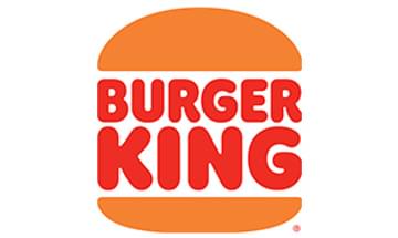 The words "BURGER KING" in big red font inside of an illustrated burger