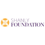 A white flower design in a yellow circle with purple text reading 'Shanly Foundation'