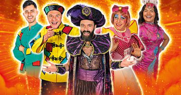 From left to right Kian Zomorodian dressed as Aladdin, Chris Pizzey dressed as Wishee Washee, James Mackenzie dressed as Abanazar, Nic Gibney dressed as Widow Twankey, and Natasha Cayabyab as Jasmine, they're all smiling on a sparkly orange background