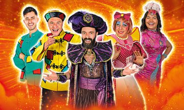 From left to right Kian Zomorodian dressed as Aladdin, Chris Pizzey dressed as Wishee Washee, James Mackenzie dressed as Abanazar, Nic Gibney dressed as Widow Twankey, and Natasha Cayabyab as Jasmine, they're all smiling on a sparkly orange background