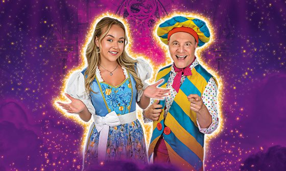 Ellie Dadd, a young white woman with blonde hair dressed as Belle, and Chris Pizzey, an older white man dressed as Louis La Plonk