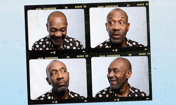 A square of four photos of Lenny Henry on a piece of film all looking at each other smiling. He is in a black shirt with large white dots