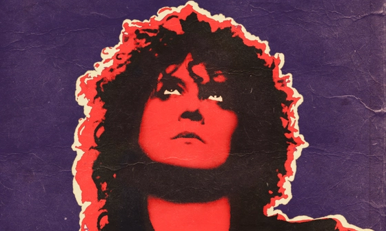 Red, purple and white artwork on crinkled paper of a man with long, thick, curly hair, who is looking up to the sky above him