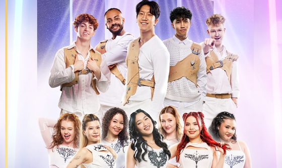 a group of K-Pop stars all in white smiling at the camera