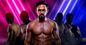 Gareth Gates, a muscular man in the centre, surrounded by four shadowy figures of other muscular men. Neon pink and blue diagonal lights behind them create a bold, intense atmosphere