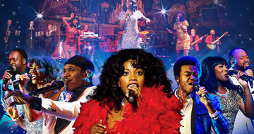 A black woman with thick curly long hair, wears a red feather dress. Behind her are two women and four men all singing into microphones and wearing retro clothing