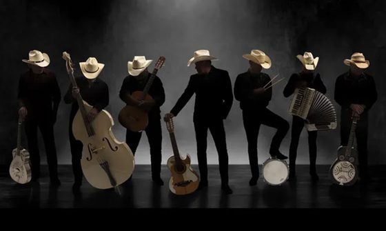 The silhouettes of seven men with cowboy hats and various instruments including guitars, drums, and an accordion