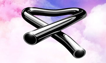 Glossy black bent tubular bell looped into a crossed shape on a pink and purple cloudy background
