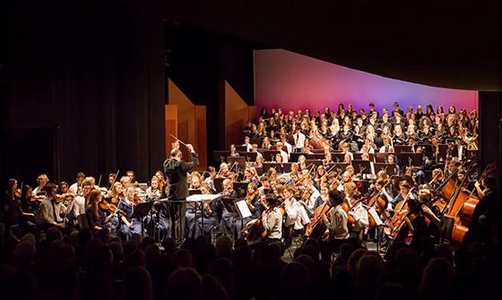 Hampshire County Youth Orchestra performing on a stage