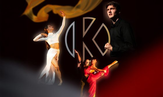 An image of four performers, a woman in white dancing, a couple in red dancing, and a man looking dramatic with his fist clenched. In the centre is a logo of a 'K'
