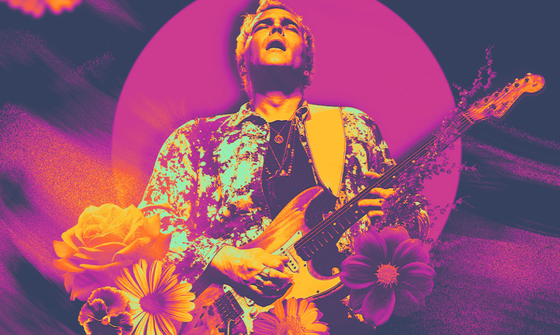 A man in an acid wash jacket leans back with his eyes closed as he plays the guitar, surrounded by flowers on a purple background