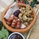 a Yorkshire pudding wrap with stuffing and pigs in blankets